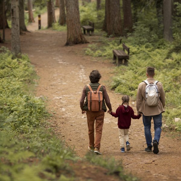 girl-with-her-dads-enjoying-family-trip